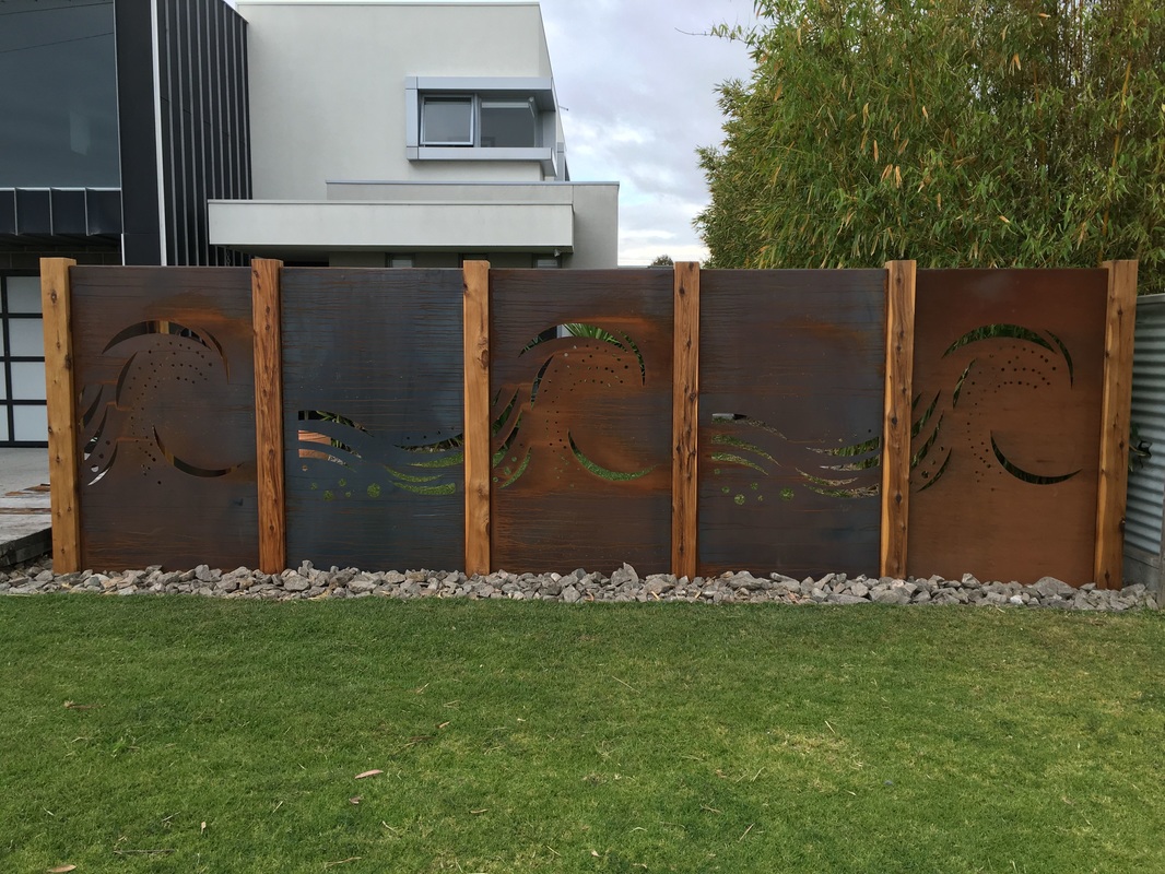 Safety Beach rustic feature fencing using corten steel panels - Coastal